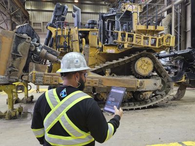 Taurus-Jose-with-Dozer-holding-a-tablet